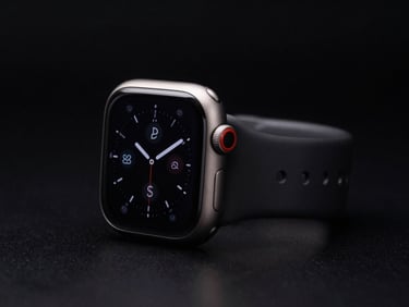 Detailed shot of an Apple Watch Ultra on a dark reflective surface, highlighting its rugged titanium case, low-key lighting.