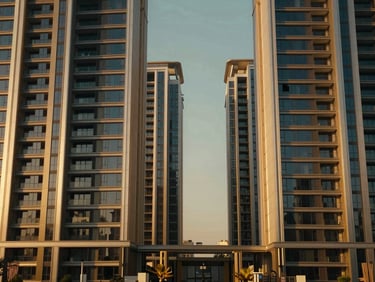 Cinematic wide shot of high-end real estate development in Saudi Arabia, modern architectural lines, golden hour lighting, luxury textures