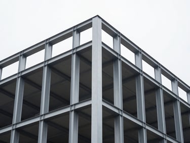 Tight macro architectural shot of a timber-to-steel structural junction on a modern building exterior, overcast natural daylight, sharp geometric lines