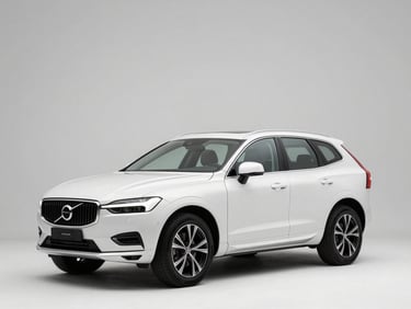 Front three-quarter driver-side profile of a white Volvo XC60, studio strobe lighting, full vehicle visible, squared frame, clean background