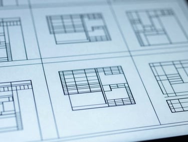 Macro shot of a neatly organized digital wireframe on a monitor, high contrast cool lighting, blueprint blue tones, sharp focus.