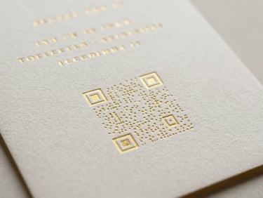 Textured wedding invitation card with an elegant gold-foiled QR code, soft ambient lighting.