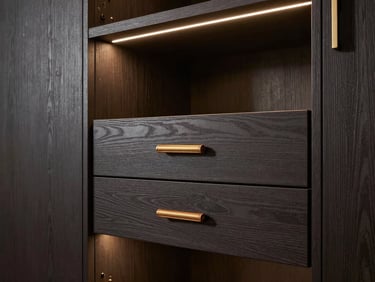 Bespoke dark oak wardrobe with integrated LED strip lighting, leather drawer pulls, architectural precision, 35mm