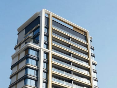 Modern architectural detail of a premium Dubai residential building, clean lines, bright blue sky, high-key light, 35mm