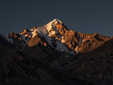 Cinematic wide shot of a rugged mountain landscape in Ladakh at golden hour, shot through a neutral density filter showing perfect color balance and deep contrast