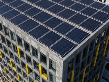 Panoramic view of a modern high-rise building with solar panels seamlessly integrated into the facade under dramatic architectural lighting