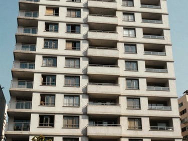 Exterior facade of a mid-rise apartment building in São Paulo, clean modern architecture, street-level natural daylight, no people, urban context visible