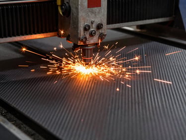 CNC plasma cutting machine slicing through a thick carbon steel plate with a bright orange high-contrast glow.