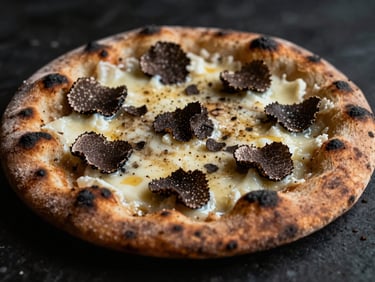 Macro shot of a blistered wood-fired flatbread with shaved black truffles and melted taleggio cheese, dark moody food photography, 35mm