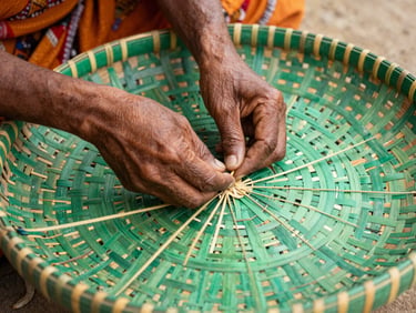 Hands of a rural artisan weaving intricate patterns into a green bamboo basket, close-up, organic textures.