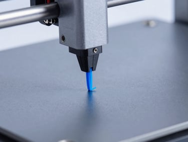 Macro shot of a 3D printer nozzle extruding clean blue filament onto a heated bed, sharp focus, cool studio lighting