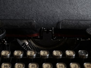 Extreme close-up of vintage typewriter keys striking textured charcoal paper, deep shadows, chiaroscuro lighting, 35mm film grain