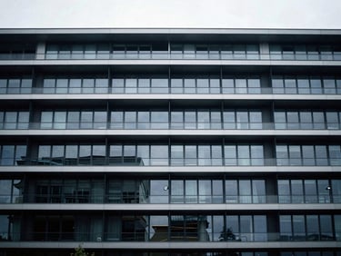 Architectural detail of a modern European port, structured lines, muted corporate tones, 35mm