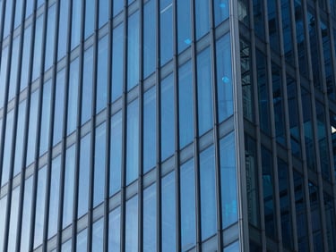 Abstract architectural geometry representing secure data flow and compliance, cool daylight, deep blues, sharp focus, 50mm