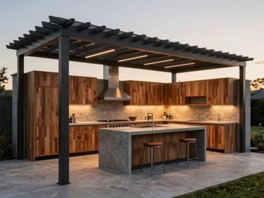 Wide shot of a luxury outdoor kitchen with teak cabinetry and a concrete island, under a modern pergola with integrated linear lighting at dusk