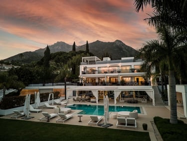 Villa Serenity Marbella at sunset with pool and La Concha mountain views