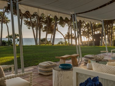 Sunset views over the sea and lush gardens from Villa El Rincon 