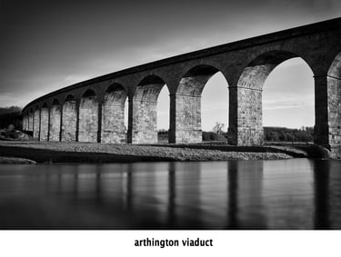arthington viaduct spanning the river wharf in black and white