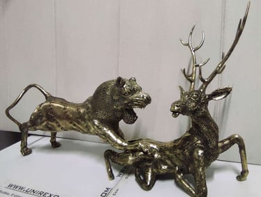 "Handcrafted brass sculpture of a lion hunting a deer-Qualified for export"