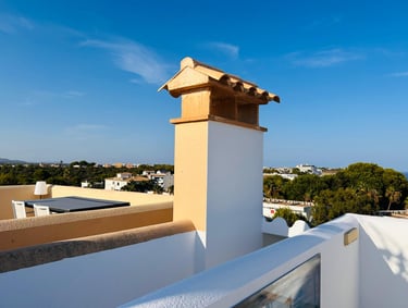 a balcony with a view of the ocean and a view of the ocean