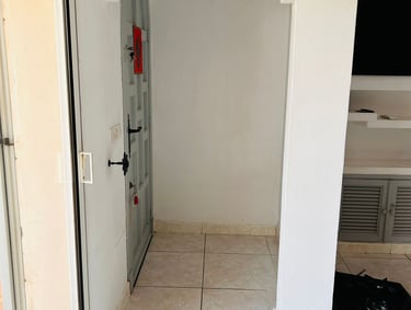 a door way with a bag on the floor