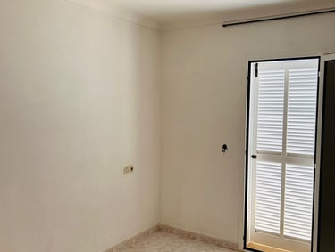 a room with a sliding glass door and a sliding glass door