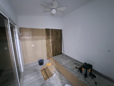 a room with a ceiling fan and a ceiling fan