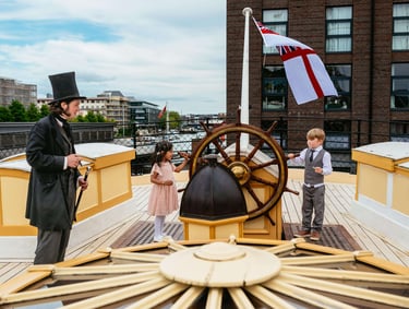 a man in a top hat and a little girl in a top hat