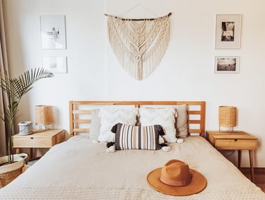 boho bedroom with big macrame wallhanging