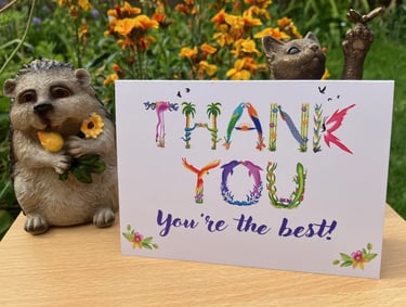 A greeting card with the words Thank You you're the best printed in tropical exotic word art