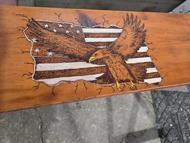eagle wood burned on a shelf