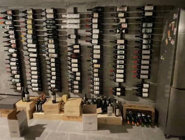 a wine rack with bottles of wine and bottles of wine