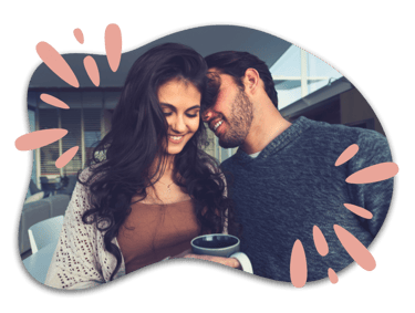 a man and woman lovingly next to eachother