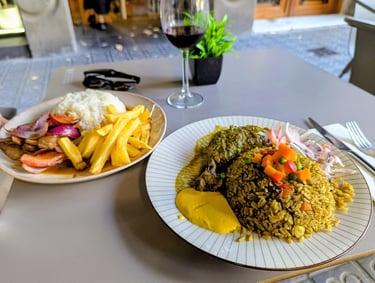 Pollo con arroz y huancaina + Lomo Saltado at Cumpanama Peruvian Restaurant