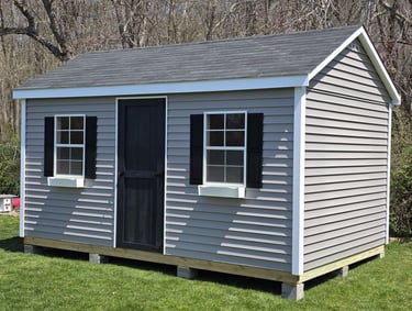 10x16 vinyl storage shed custom built in Pembroke, Massachusetts, low-maintenance outdoor storage.