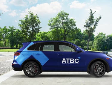 a blue car with a blue arrow on the side of it