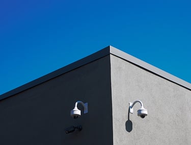 two cameras on a building