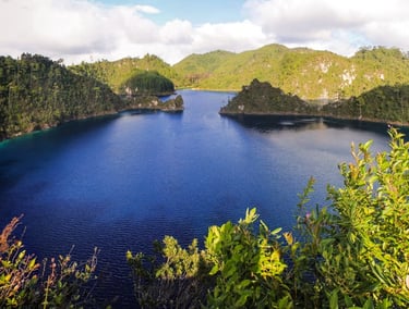 A panoramic view of the Montebello Lakes with crystal clear blue water in Chiapas Mexico