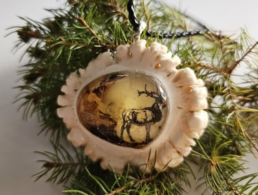 Antler pendant with amber