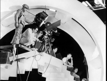 Berkeley and crew filming Judy Garland and Mickey Rooney’s “I Got Rhythm” with cowboy dancers.