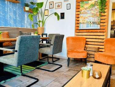 a living room with a couch and a table