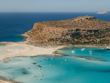 Balos Lagoon shallow turquoise water and white sandbars in a curved lagoon