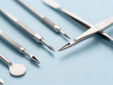 Close-up of orthopedic bone chisels and beauty tweezers, sterile silver metal, sharp focus