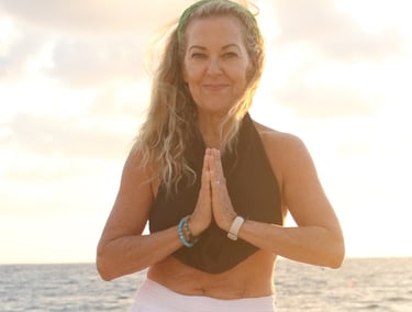yoga instructor Erin Burden.  Yoga on the beach Playa del Carme
