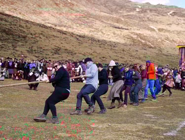 visitors-trying-tug-of-war-against-the-local-inhabiitants-of-the-highland-at-laya-bhutan
