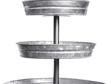 a three tiered cake with a metal stand
