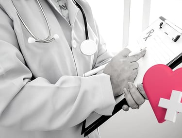 a doctor holding a heart shaped piece of paper