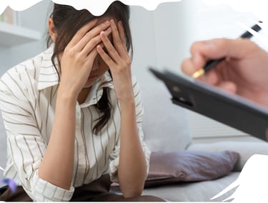 a woman with a pen and a man in a suit
