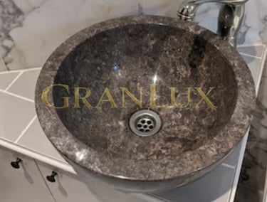 Раковина з дідковицького граніту