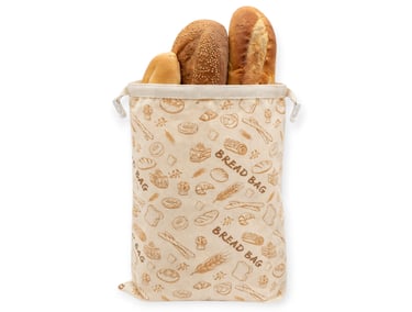 Reusable linen bread bag with a drawstring filled with fresh artisan loaves and baguette.